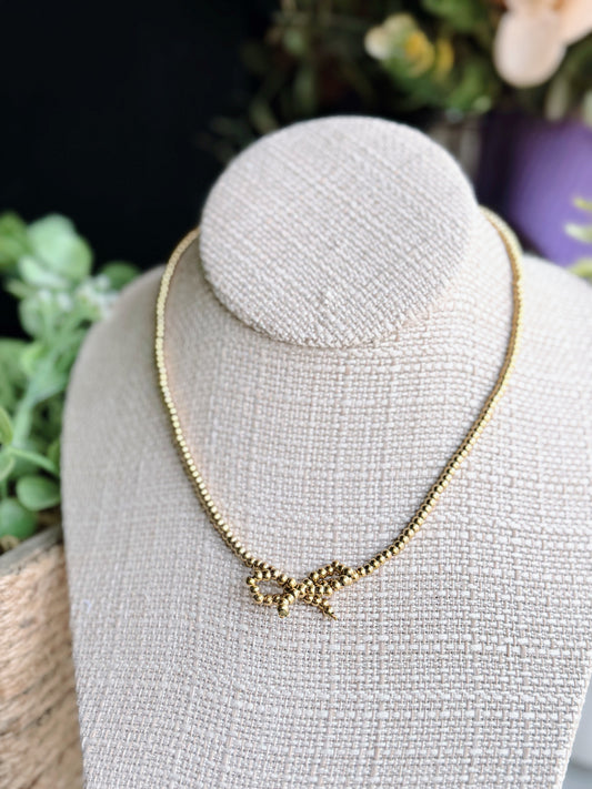 Gold Beaded Bow Necklace